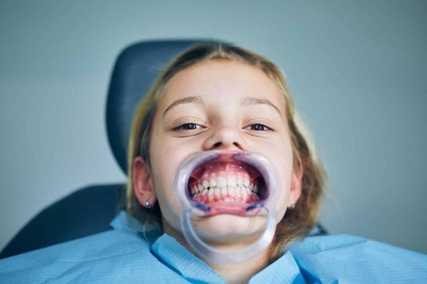 Girl during dental examination